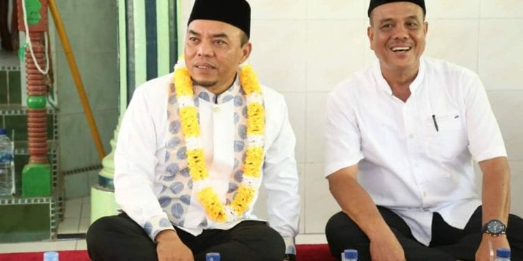 Bupati Labuhanbatu saat berada pada acara wirit yasin akbar di Masjid Raya Ajamu, Kecamatan Panai Hulu, Kabupaten Labuhanbatu.