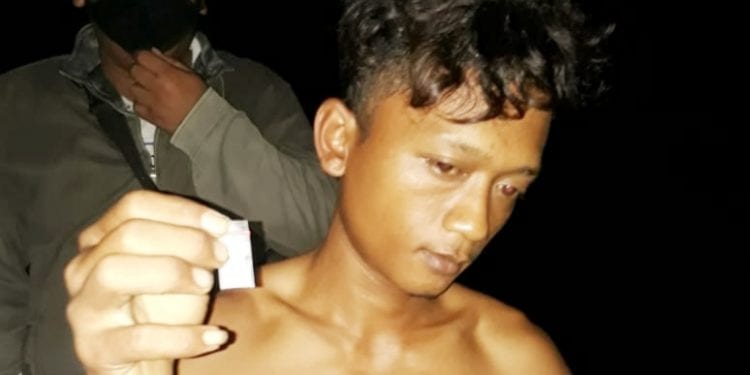 Tersangka Sukirman alias Kecut saat ditangkap di TKP.