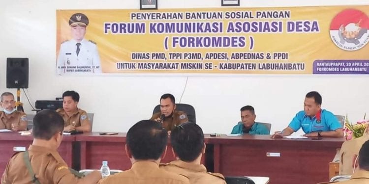 Plt Kadis PMD Labuhanbatu Abdi saat memimpin rapat.