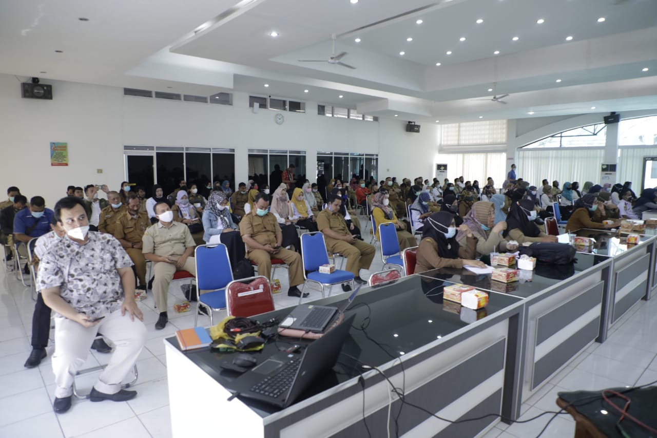 sosialisasi penerapan CSM bagi para OPD. Acara digelar di Aula Melati Kantor Bupati Asahan,