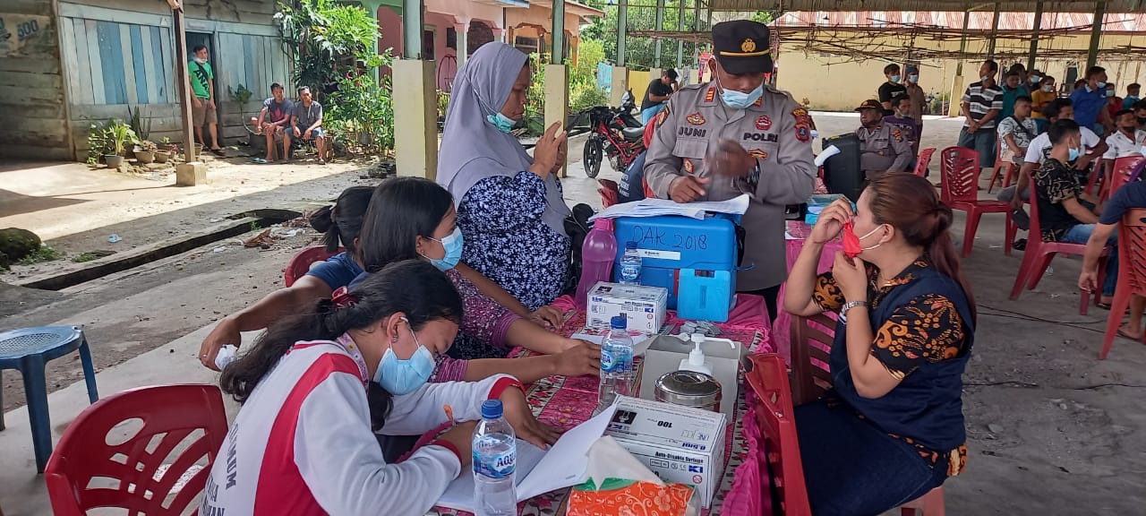 Pihak Polres Asahan Vaksin 1,160 Siswa dan Lansia