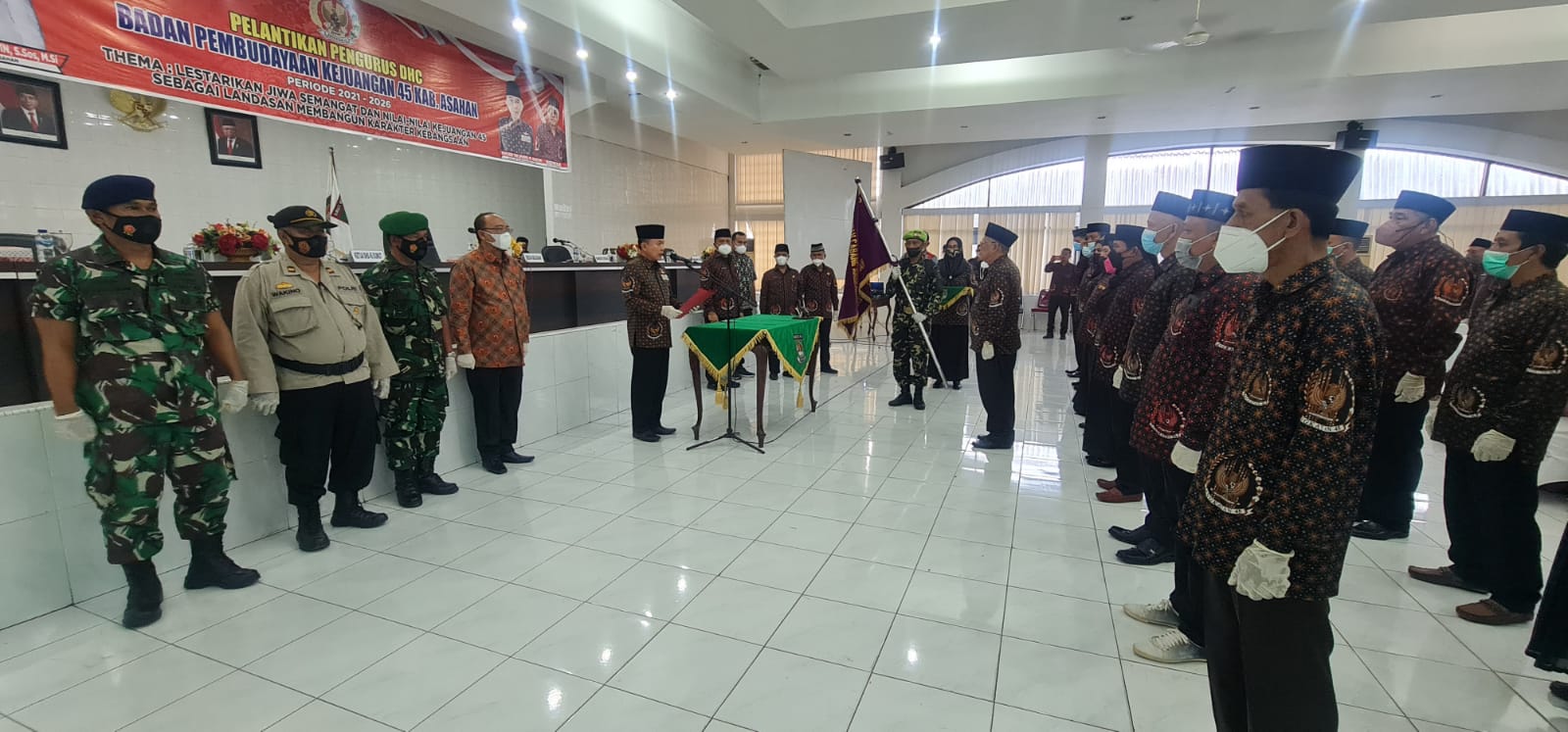 Sekdakab Asahan saat menghadiri pelantikan pengurus Dewan Harian Cabang ,(DHC) Badan Pembudayaan Kejuangan 45 Kabupaten Asahan