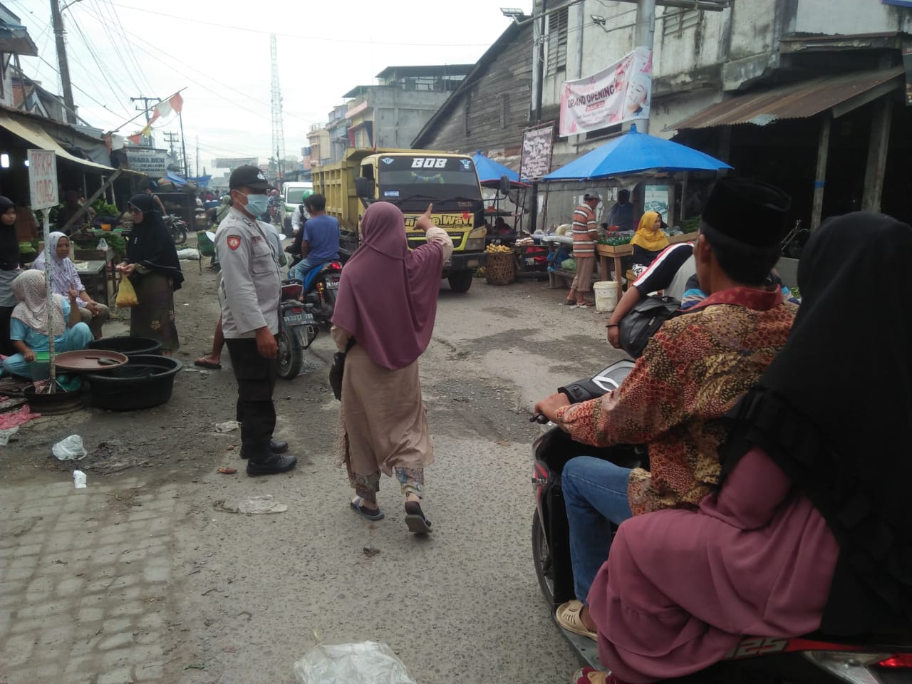 Personel Polsek Air Joman Polres Asahan Imbau Masyarakat Terapkan Prokes