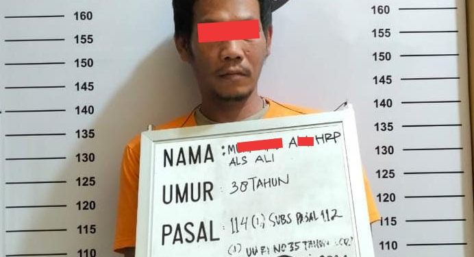 Tersangka MAH alias Ali