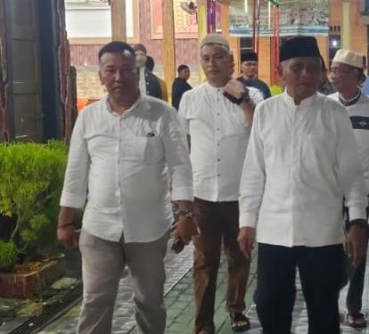 Ok Rasyid bersama Bupati Asahan Surya.