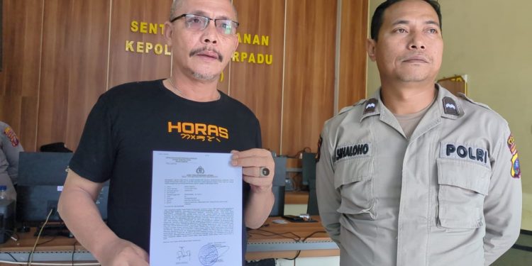 Anggota IWO Samosir membuat laporan ke polisi.